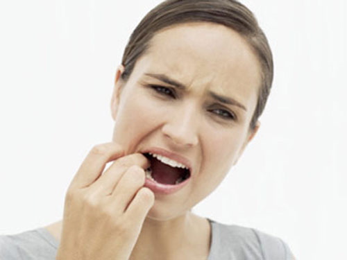 Trồng răng bị sưng nguyên nhân và cách khắc phục là gì? 1